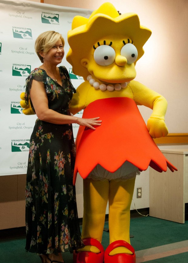 THE SIMPSONS: Cast member Yeardley Smith and the city of Springfield, OR celebrates THE SIMPSONS 25th ANNIVERSARY with the unveiling of the Simpsons mural during a block party dedication ceremony on their downtown walk of murals on Monday, Aug. 25th. THE SIMPSONS ª and © 2014 TCFFC ALL RIGHTS RESERVED.