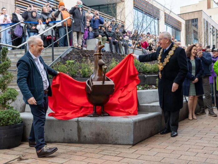 Preston-born Wallace & Gromit creator Nick park (left) unveiled a new Feathers McGraw statue in his home town alongside Mayor of Preston Councillor Philip Crowe. [photo c/o Preston City Council]