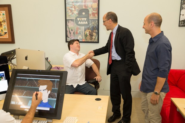 Art Director David SanAngelo, left, U.S. Secretary of Labor Tom Perez and Art Director Aaron Hawkins. Both Hawkins, who lead the tour of the studio on Aug. 22, and SanAngelo were hired as part of the OJT program, a federally funded program that is administered locally.