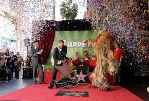 (L-R) Walt Disney Studios President Rich Ross, Hollywood Chamber of Commerce President/CEO Leron Gubler and the Jim hensonCompany CEO, Lisa Henson attend the star unveiling for The Muppets who were honored with 2,466th Star on the Hollywood Walk of Fame in front of the El Capitan Theatre on March 20, 2012 in Hollywood, California. (Photo by Frazer Harrison/Getty Images)